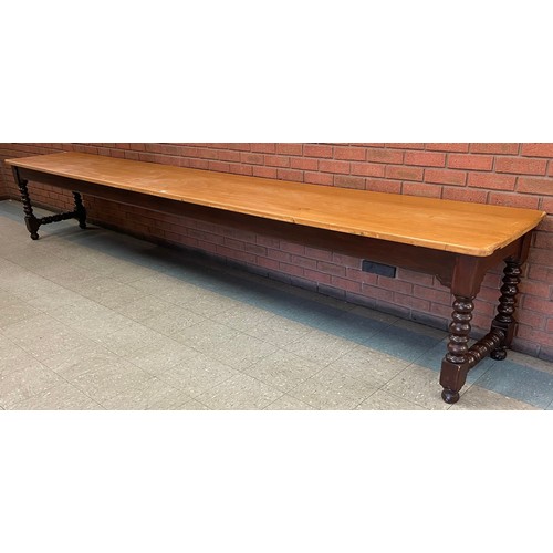 166 - An extremely large Victorian pine scrub top country house serving table (72 x 430 x 64cms)