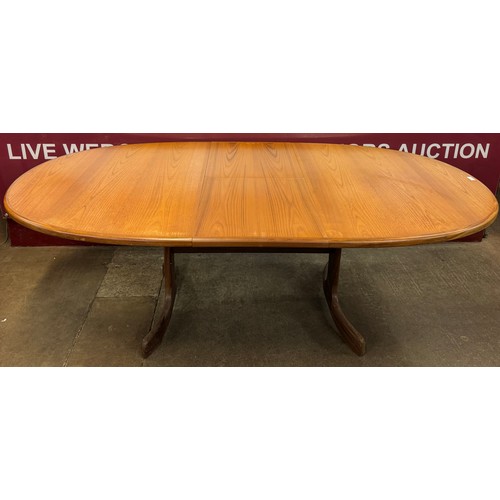 59 - A G-Plan Fresco teak oval extending dining table and six chairs