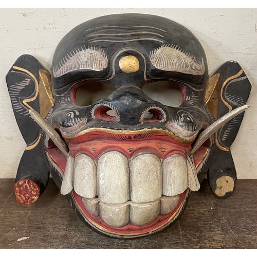 415 - A collection of handmade Native American and North American masks