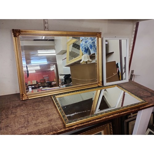 429 - Two gilt framed mirrors and one other