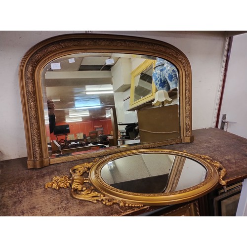 431 - A Victorian gilt overmantel mirror and one other