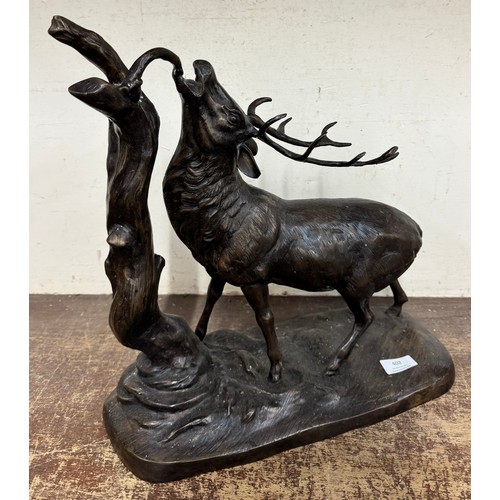 402 - A French style bronze figure of a stag