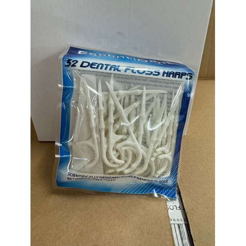 5257 - A box of 120 packs of 32 Essentident dental floss harps * This lot is subject to VAT