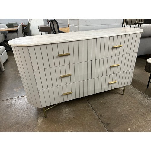 3005 - A mango wood and marble chest * This lot is subject to Vat