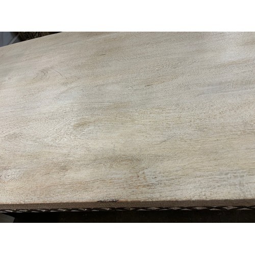 3007 - A wooden coffee table with a sandblast antique white lime finish