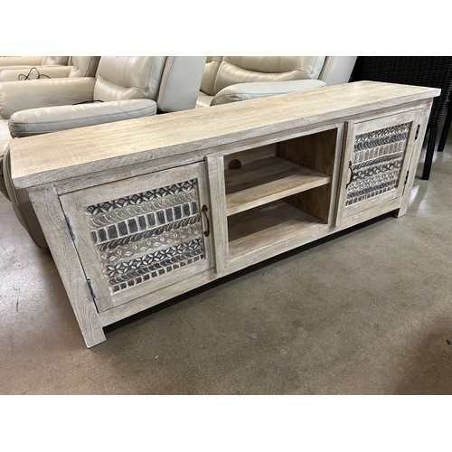 3026 - A wooden tv cabinet with a sandblast antique white finish