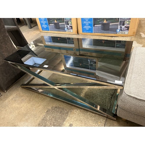 3136 - A black glass and chrome coffee table