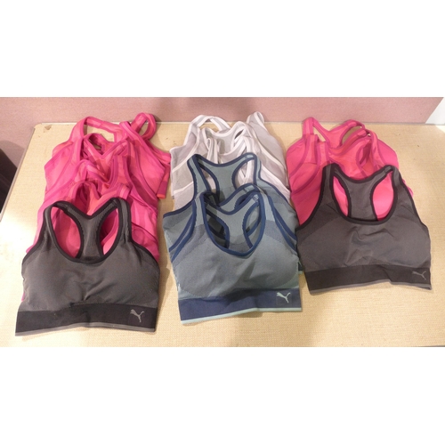 6122 - Puma Performance Sports bras x 16, loose. Various colours and sizes (335-56) *This lot is subject to... 