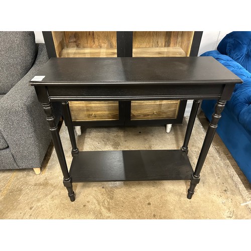 3063 - A small black console table