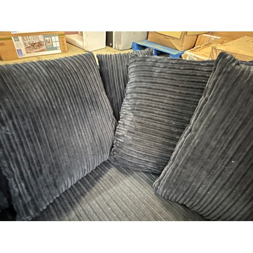 3233 - A black jumbo cord upholstered compact corner sofa - (transit marked)