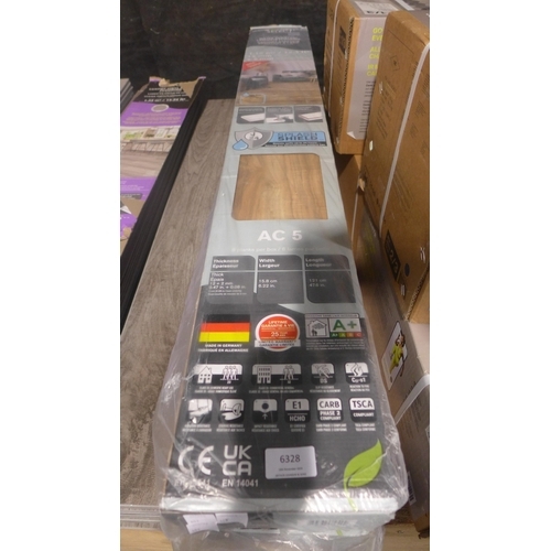 6328 - Three Packs Of Toasted Almond Laminate Flooring  (341-403-405) *This lot is subject to Vat