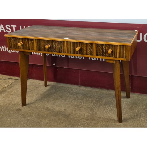 2 - A Morris of Glasgow Cumbrae afromosia four drawer console table, designed by Neil Morris