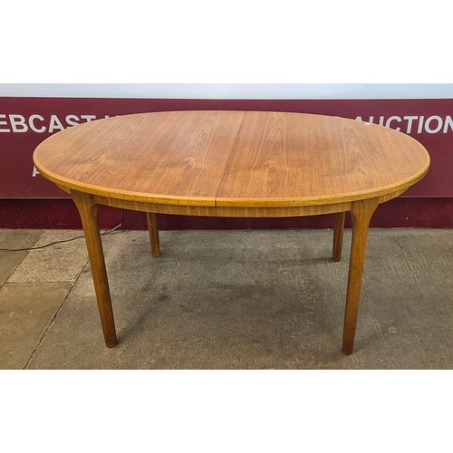 3 - A McIntosh teak oval extending dining table