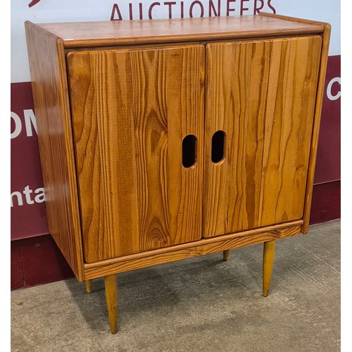 5 - A Danish style stained pine two door side cabinet