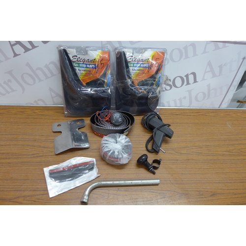 5242 - A bag of various car parts and accessories including mud flaps, oil pressure meter etc.