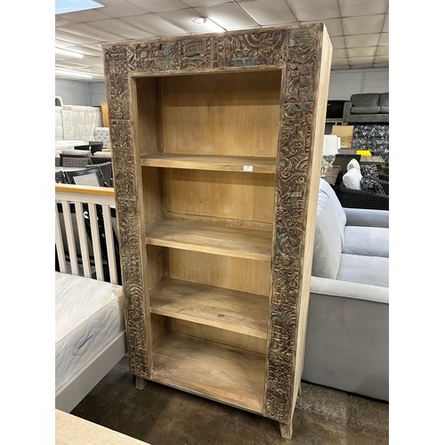 3026 - A wooden bookcase with an antique white lime finish