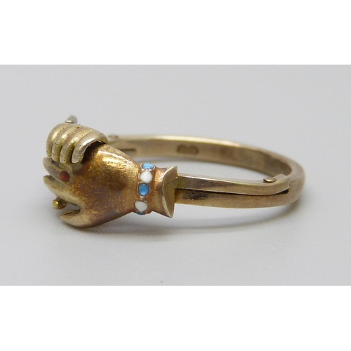 7005 - A 9ct gold and enamel clasped hands ring, opens to reveal an enamel heart, 3.6g, L/M