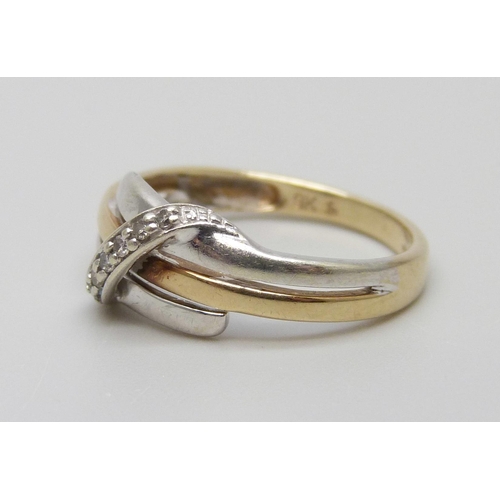 7007 - A 9ct gold and white gold diamond ring, 2g, L