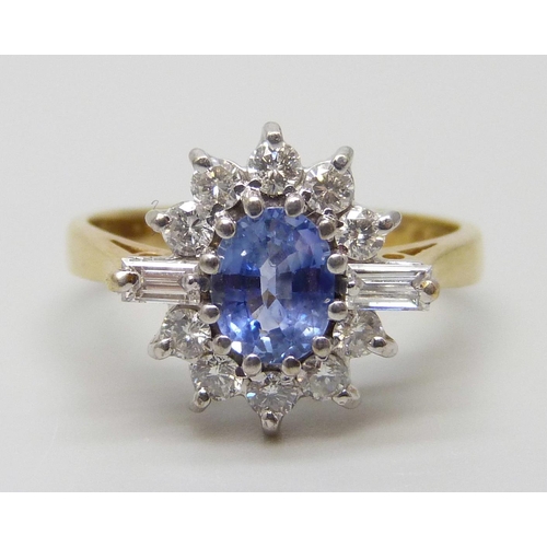 7014 - An 18ct gold, diamond and sapphire ring, 3.9g, L/M