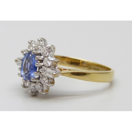 7014 - An 18ct gold, diamond and sapphire ring, 3.9g, L/M