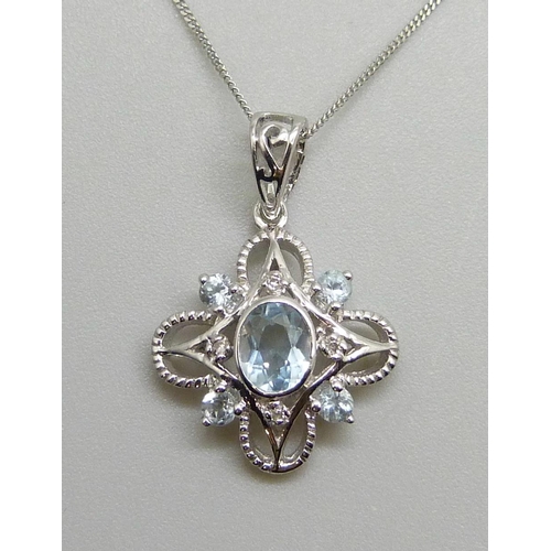 7015 - A 9ct white gold and aquamarine pendant and chain, 1.9g, chain 46cm