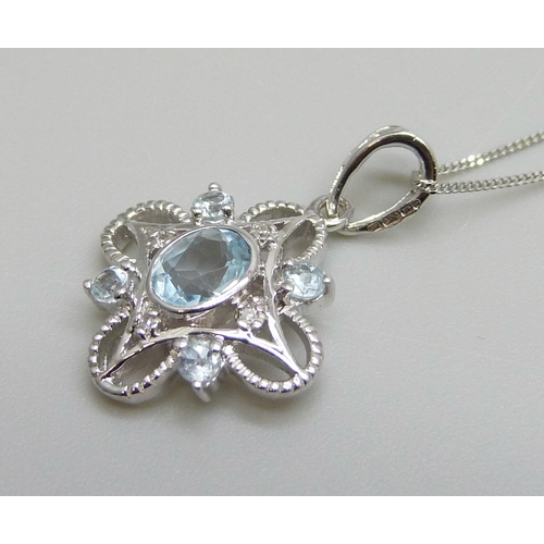 7015 - A 9ct white gold and aquamarine pendant and chain, 1.9g, chain 46cm