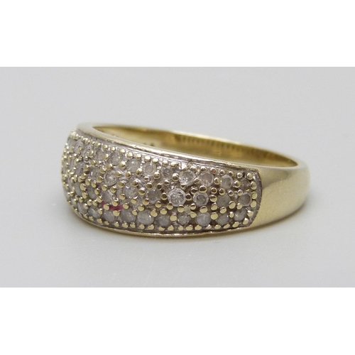 7025 - A 9ct gold and diamond ring, 3.3g, O