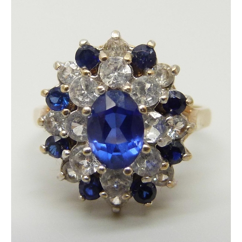 7034 - A 9ct gold blue and white stone cluster ring, 3.6g, M/N