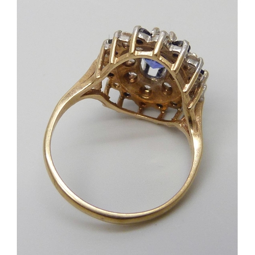 7034 - A 9ct gold blue and white stone cluster ring, 3.6g, M/N