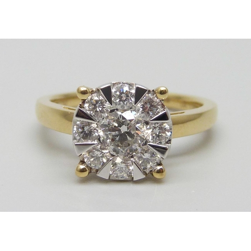 7037 - An 18ct gold and diamond ring, set with nine diamonds, the shank marked 1.00, 5.3g, P, ring top 10mm... 