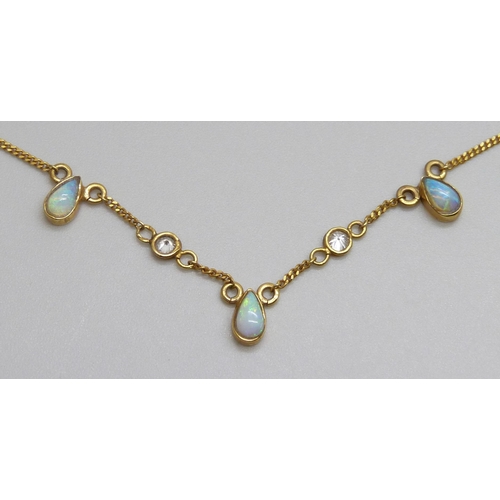 7049 - A 9ct gold, opal and diamond set necklet, 2.1g, 37cm