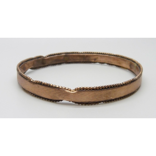 7050 - A 9ct gold bangle, a/f, 11.6g