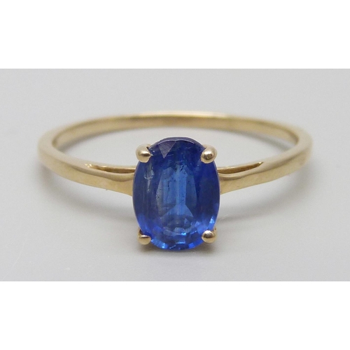 7053 - A 10k gold and blue stone ring, 1.8g, U