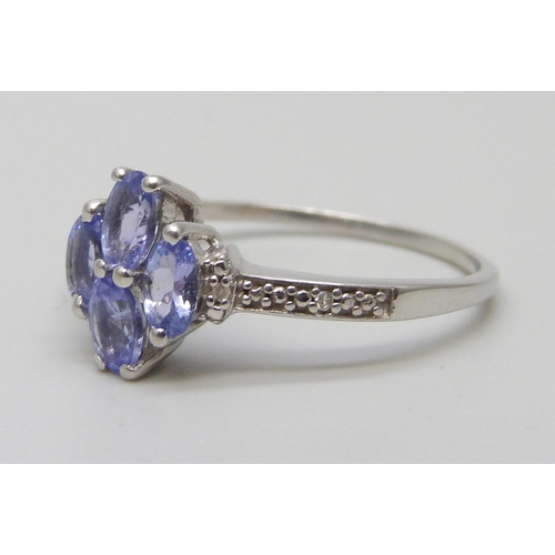 7054 - A 10k white gold and tanzanite ring, 2.4g, U