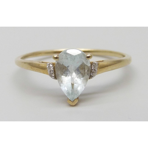 7058 - A 10k aquamarine and diamond ring, 1.7g, U