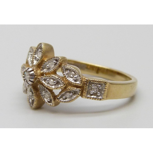 7062 - A 9ct gold and diamond ring, 2.8g, K