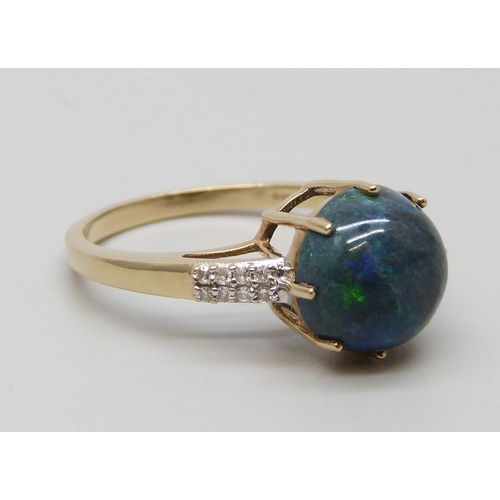 7065 - A 9ct gold, black opal and diamond ring, 3.1g, P, diameter of opal 9mm