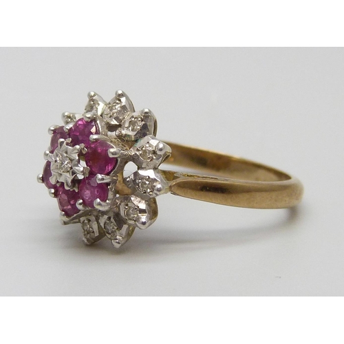 7072 - A 9ct gold cluster ring set with diamonds and rubies, 3.4g, M/N