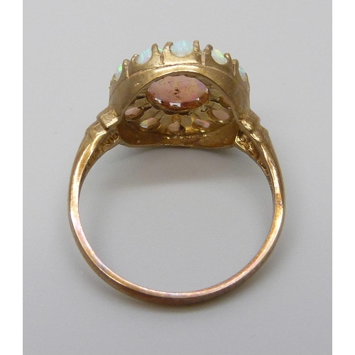 7073 - A 9ct gold opal cluster ring, 3.2g, O