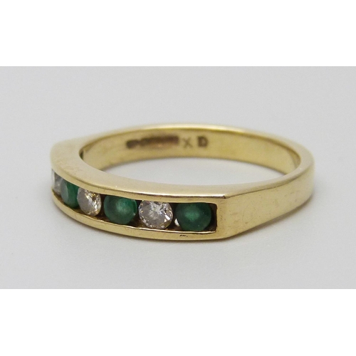 7080 - An 18ct gold, emerald and diamond ring, 3.9g, N/O