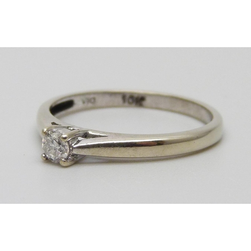 7081 - A 10k white gold diamond solitaire ring, 1.5g, N