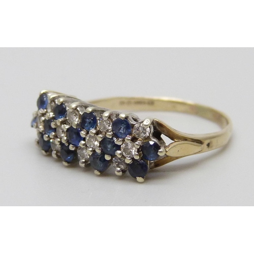 7084 - A 9ct gold, sapphire and diamond three row ring, 2.7g, M/N