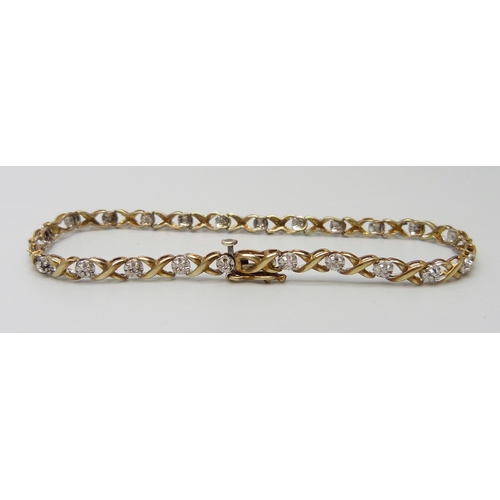 7086 - A 9ct gold and diamond tennis bracelet, 4.4g, 18cm