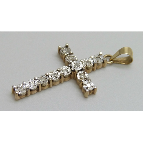 7090 - A 9ct gold and diamond cross pendant, 2g, 3cm