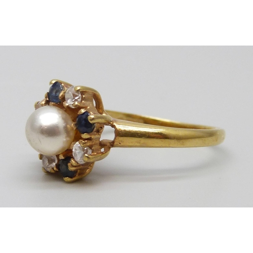 7093 - A 9ct gold, sapphire, faux pearl and zircon cluster ring, 2.7g, O/P