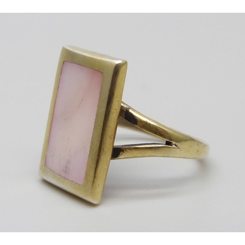 7110 - A silver gilt mother of pearl set ring, O