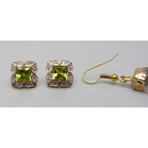 7111 - A pair of silver gilt peridot and zircon earrings and a pair of drop earrings