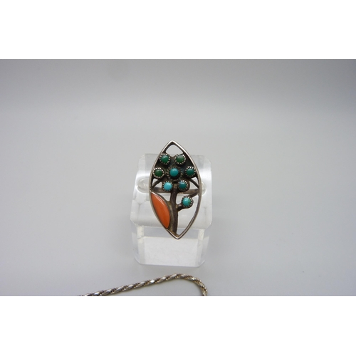 7117 - A silver Navajo style ring, marked Zun W & V Sanchez, and a silver necklace