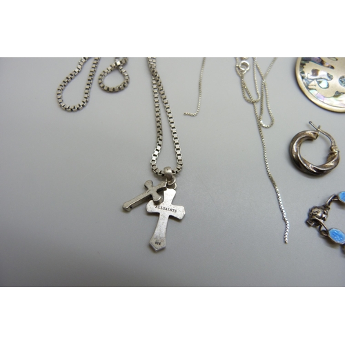 7123 - A collection of silver, white metal and other jewellery including an All Saints silver cross necklac... 