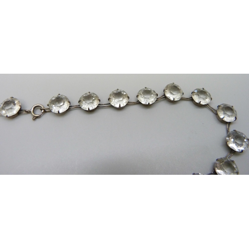 7133 - A silver riviera necklace set with white paste stones, 29g, 42cm